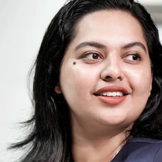 Anmary Jiju K at her desk