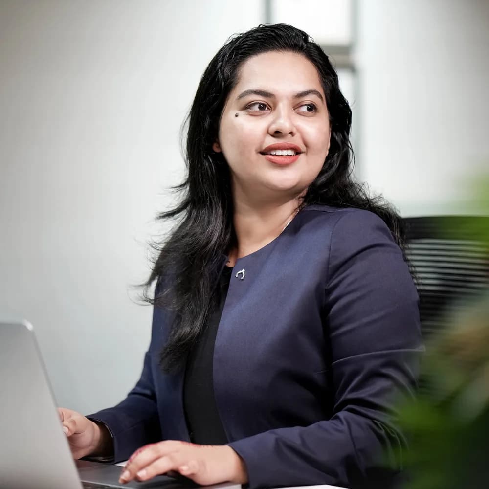 Anmary Jiju K at her desk