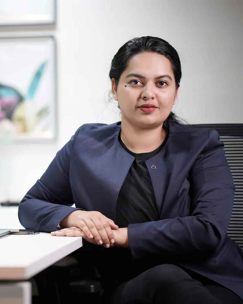 Anmary Jiju K at her desk